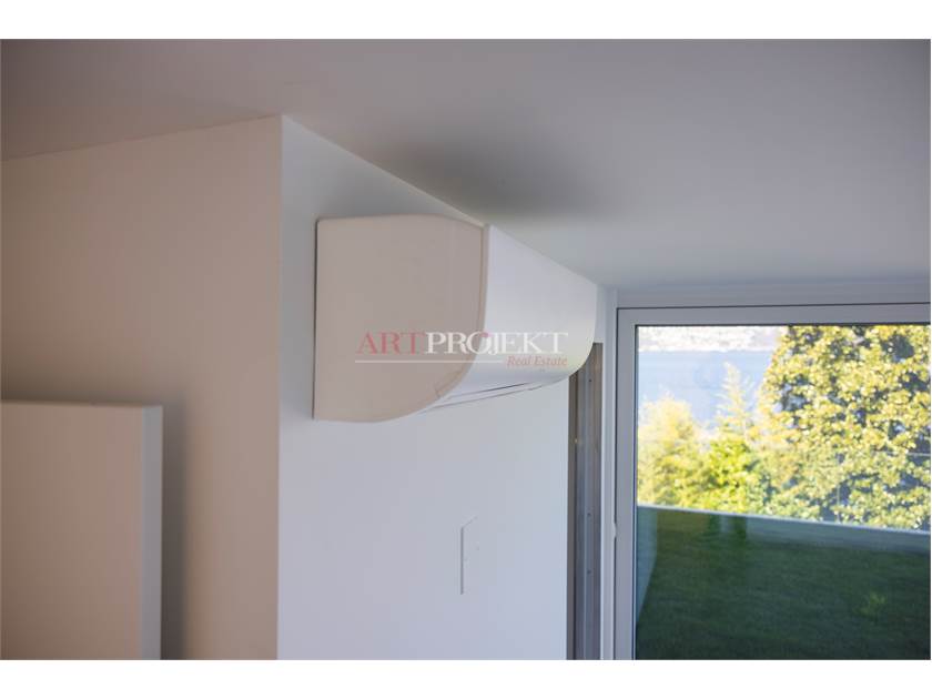 2.5 Locali con Giardino e Vista Lago / ARTPROJEKT