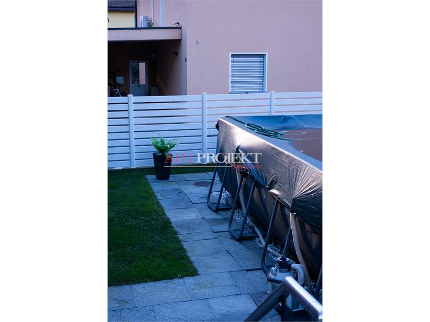 BELLISSIMO APPARTAMENTO CON GIARDINO A SANT'ANTONINO / ArtProjekt SA