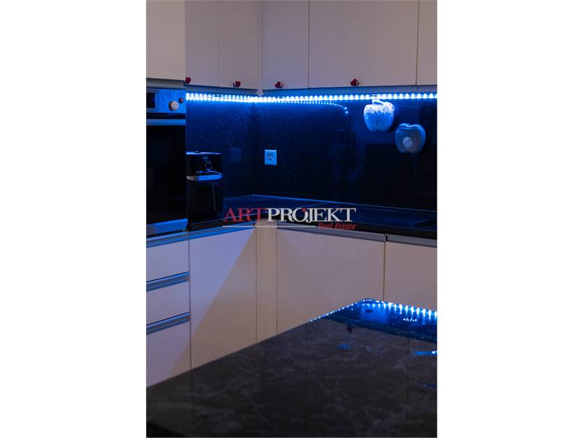 BELLISSIMO APPARTAMENTO CON GIARDINO A SANT'ANTONINO / ArtProjekt SA