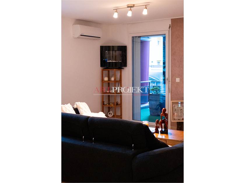 BELLISSIMO APPARTAMENTO CON GIARDINO A SANT'ANTONINO / ArtProjekt SA