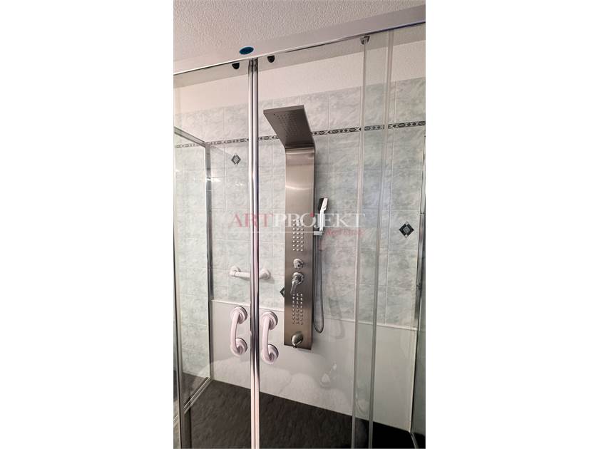 BELLISSIMO APPARTAMENTO CON GIARDINO A SANT'ANTONINO / ArtProjekt SA