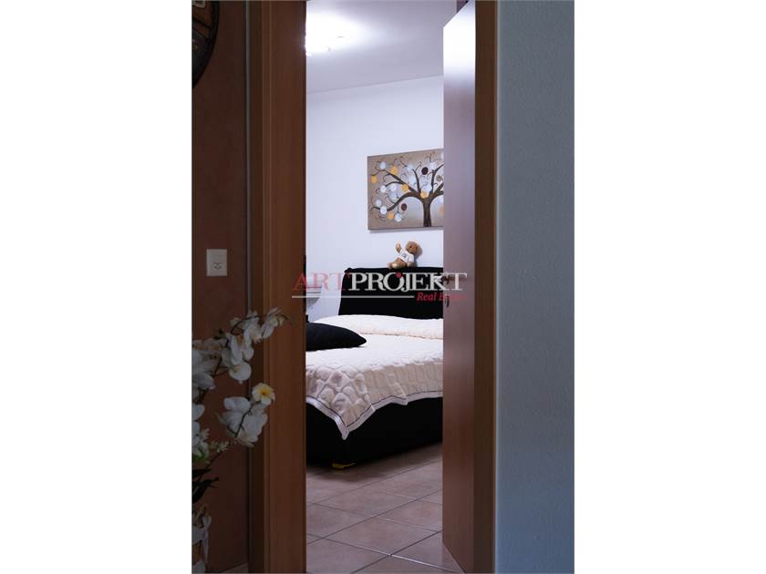 BELLISSIMO APPARTAMENTO CON GIARDINO A SANT'ANTONINO / ArtProjekt SA