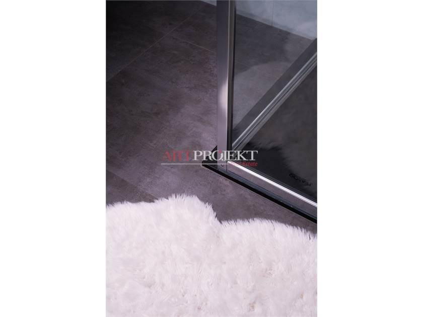 BELLISSIMO APPARTAMENTO CON GIARDINO A SANT'ANTONINO / ArtProjekt SA