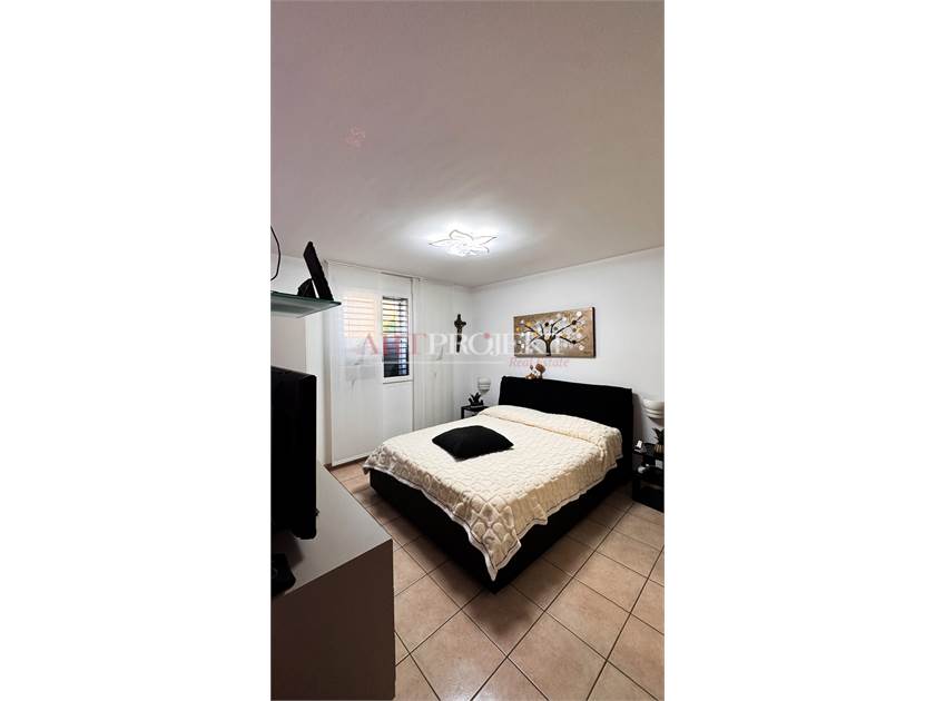 BELLISSIMO APPARTAMENTO CON GIARDINO A SANT'ANTONINO / ArtProjekt SA