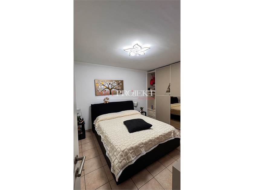 BELLISSIMO APPARTAMENTO CON GIARDINO A SANT'ANTONINO / ArtProjekt SA