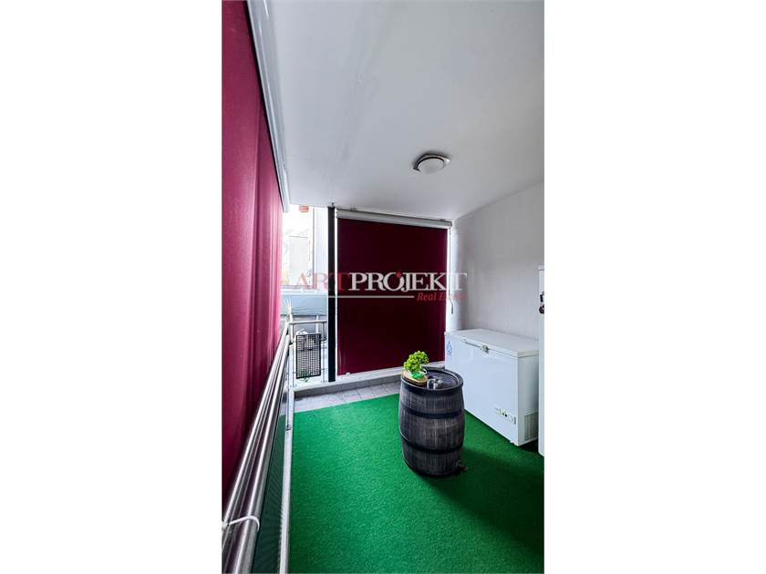 BELLISSIMO APPARTAMENTO CON GIARDINO A SANT'ANTONINO / ArtProjekt SA