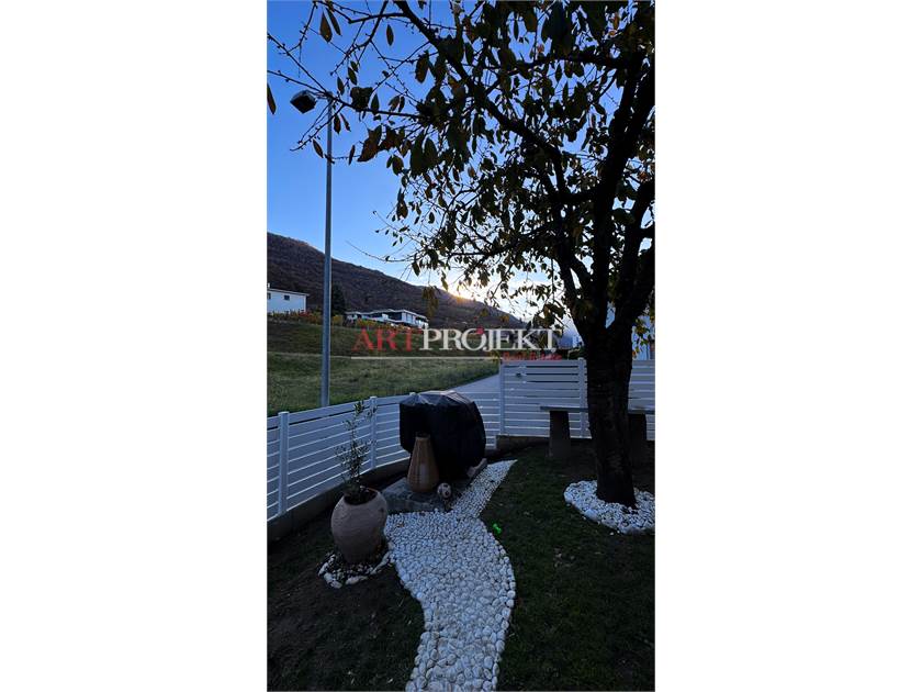 BELLISSIMO APPARTAMENTO CON GIARDINO A SANT'ANTONINO / ArtProjekt SA