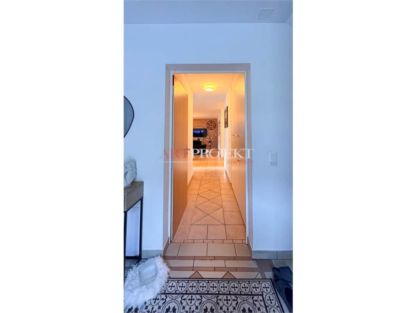 BELLISSIMO APPARTAMENTO CON GIARDINO A SANT'ANTONINO / ArtProjekt SA