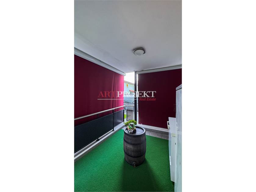 BELLISSIMO APPARTAMENTO CON GIARDINO A SANT'ANTONINO / ArtProjekt SA