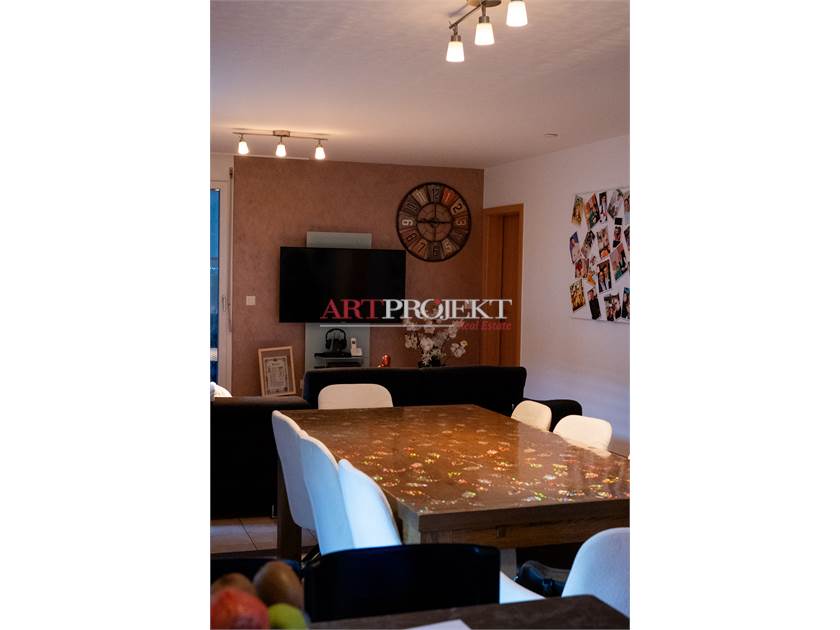 BELLISSIMO APPARTAMENTO CON GIARDINO A SANT'ANTONINO / ArtProjekt SA