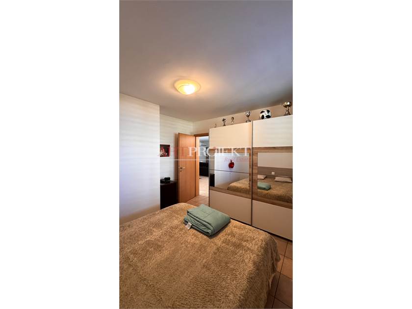 BELLISSIMO APPARTAMENTO CON GIARDINO A SANT'ANTONINO / ArtProjekt SA