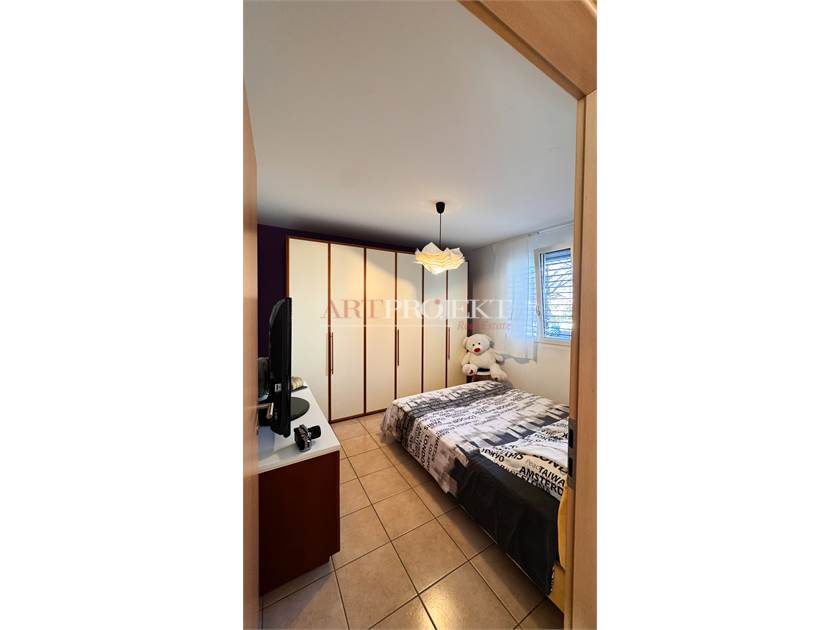 BELLISSIMO APPARTAMENTO CON GIARDINO A SANT'ANTONINO / ArtProjekt SA