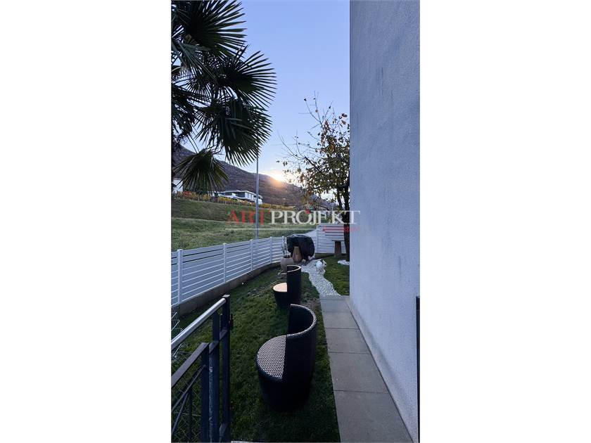 BELLISSIMO APPARTAMENTO CON GIARDINO A SANT'ANTONINO / ArtProjekt SA