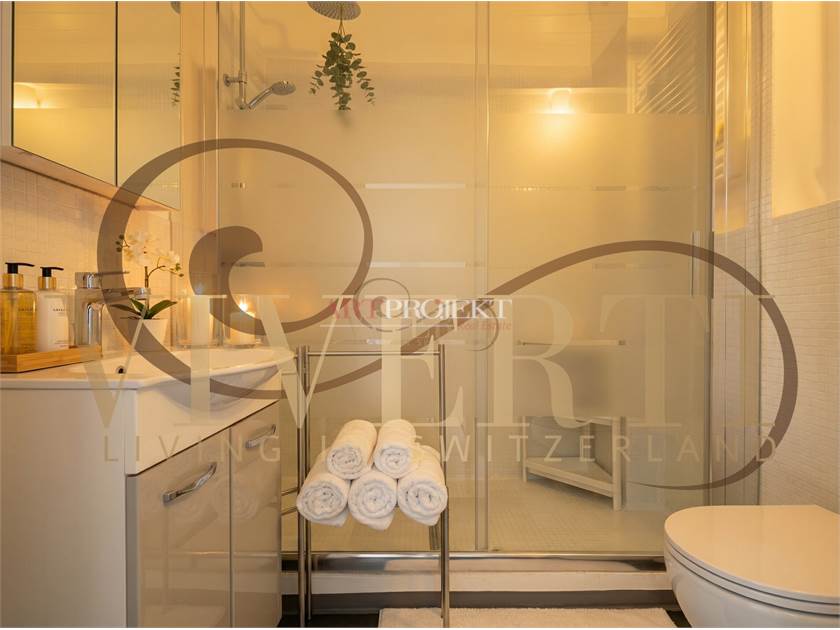 PALAZZINA CON 4 IMMOBILI A MORCOTE / ArtProjekt SA