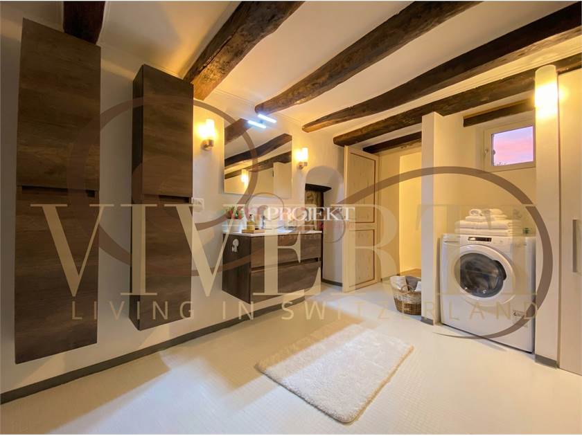 PALAZZINA CON 4 IMMOBILI A MORCOTE / ArtProjekt SA