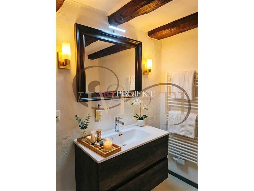 PALAZZINA CON 4 IMMOBILI A MORCOTE / ArtProjekt SA