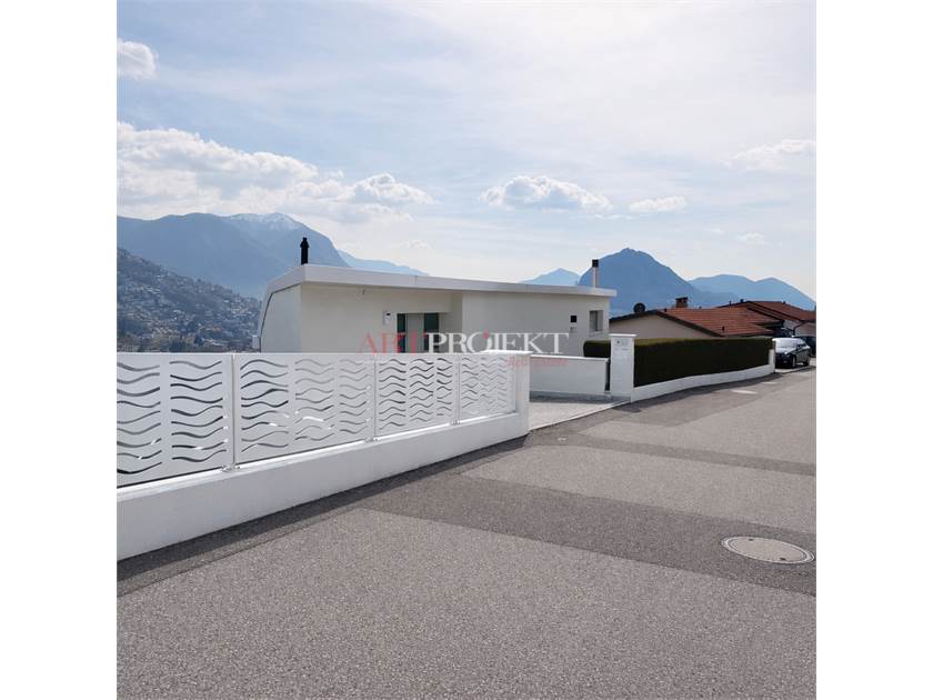 Lugano – Prestigiosa villa con vista lago e raffinati spazi esterni / ArtProjekt SA