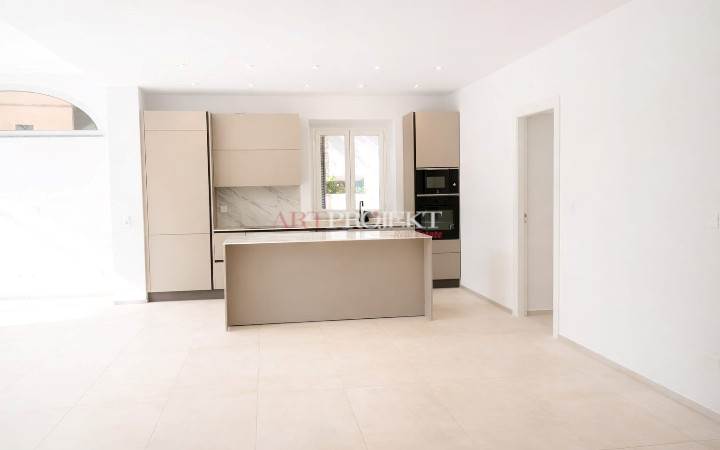Figino – Elegant 3.5-room apartment with private garden and open view of greenery / ArtProjekt SA