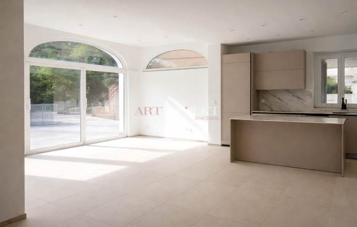 Figino – Elegant 3.5-room apartment with private garden and open view of greenery / ArtProjekt SA