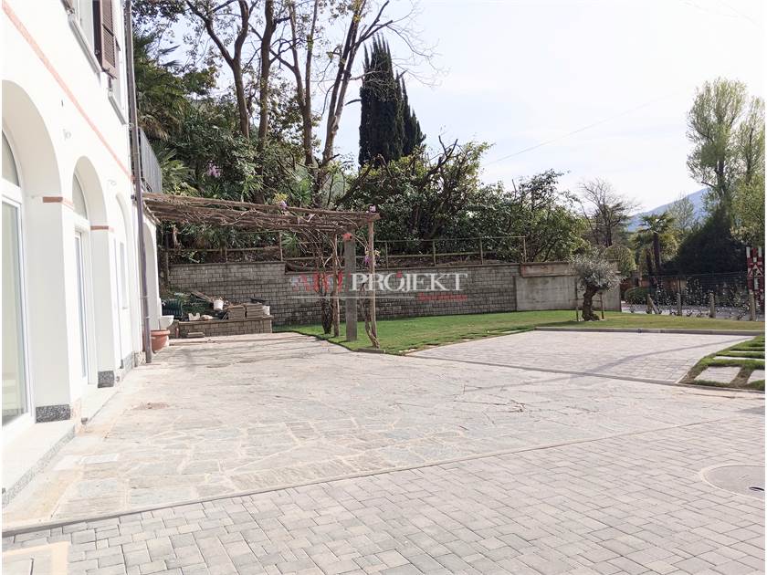 Figino – Elegant 3.5-room apartment with private garden and open view of greenery / ArtProjekt SA