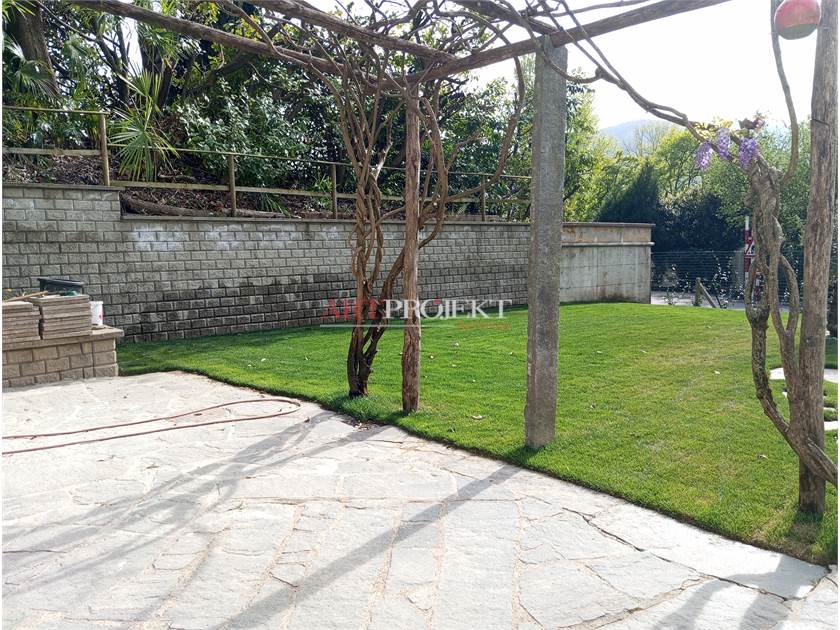 Figino – Elegant 3.5-room apartment with private garden and open view of greenery / ArtProjekt SA