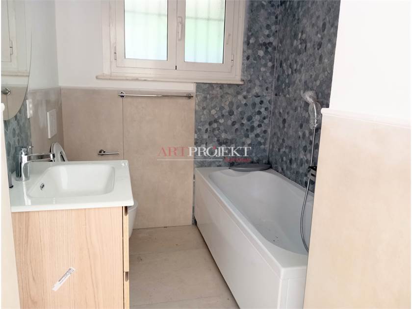 Figino – Elegant 3.5-room apartment with private garden and open view of greenery / ArtProjekt SA