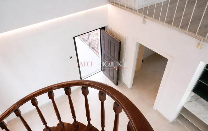 Elegant apartment with attic in Figino / ArtProjekt SA