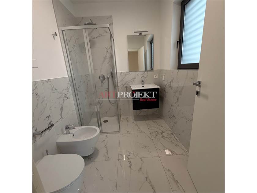 Massagno (TI) – Bright 4.5-room apartment with 2 indoor garage parking spaces / ArtProjekt SA