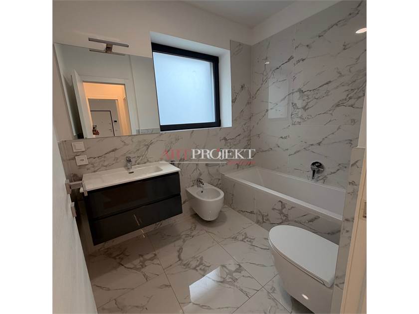 Massagno (TI) – Bright 4.5-room apartment with 2 indoor garage parking spaces / ArtProjekt SA