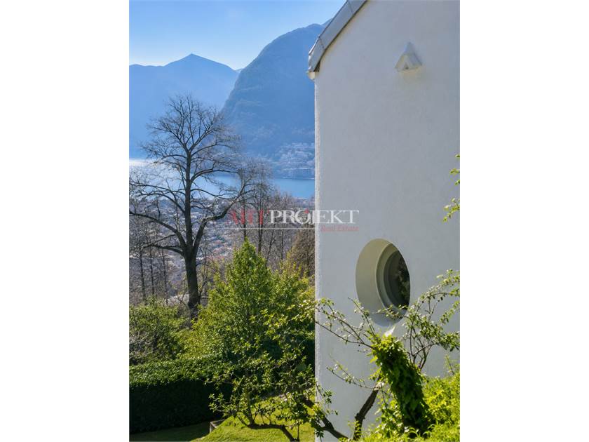 Lugano – Prestigiosa villa con vista lago e raffinati spazi esterni / ArtProjekt SA