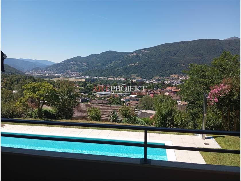 Comano – Elegante appartamento 2.5 locali con piscina e vista panoramica / ArtProjekt SA